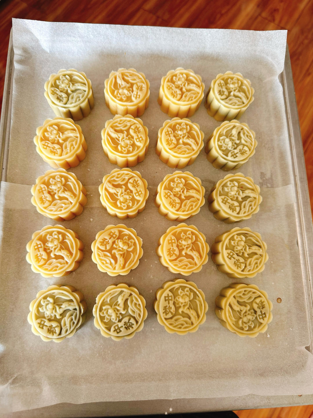 Mooncake being pressed in a carved mold
