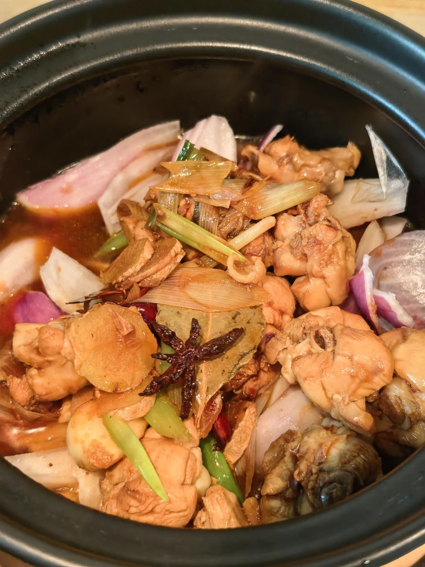 Chicken transferred into the clay pot