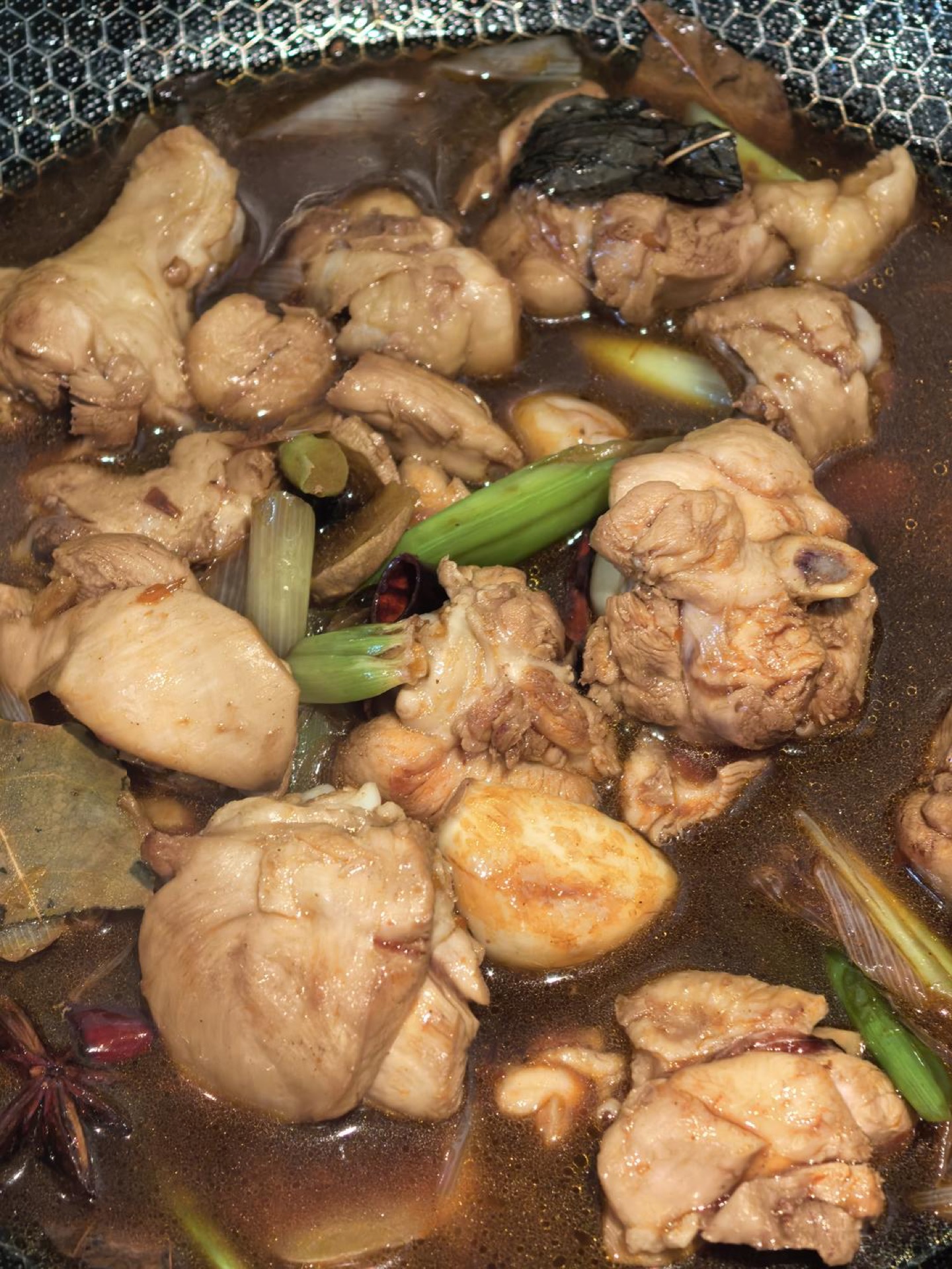 Hot water poured over the chicken