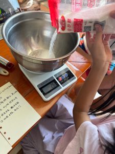 Dry ingredients measured into a mixing bowl