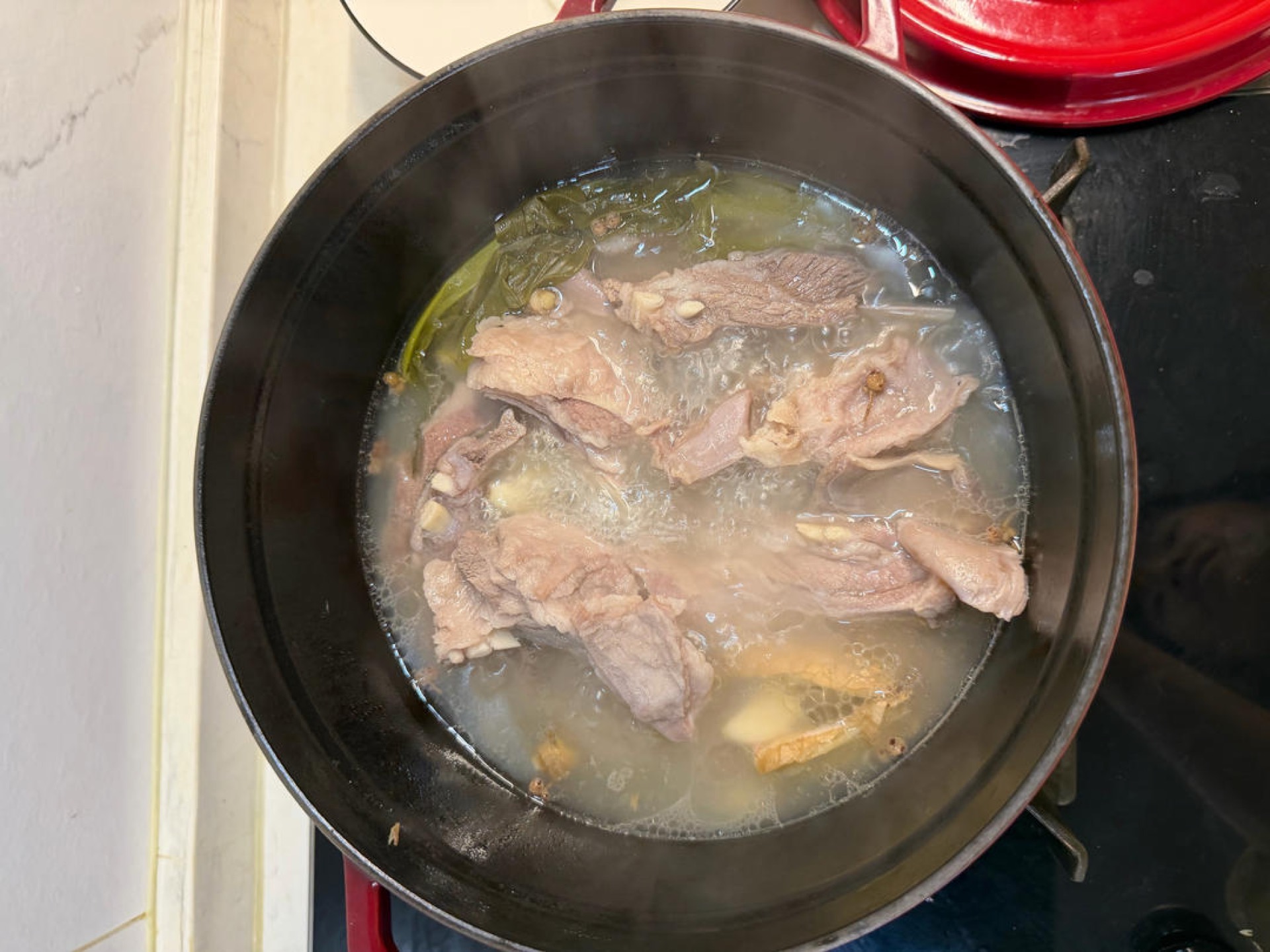 Simmer over low heat; after about 1 hour it should look roughly like the photo.
