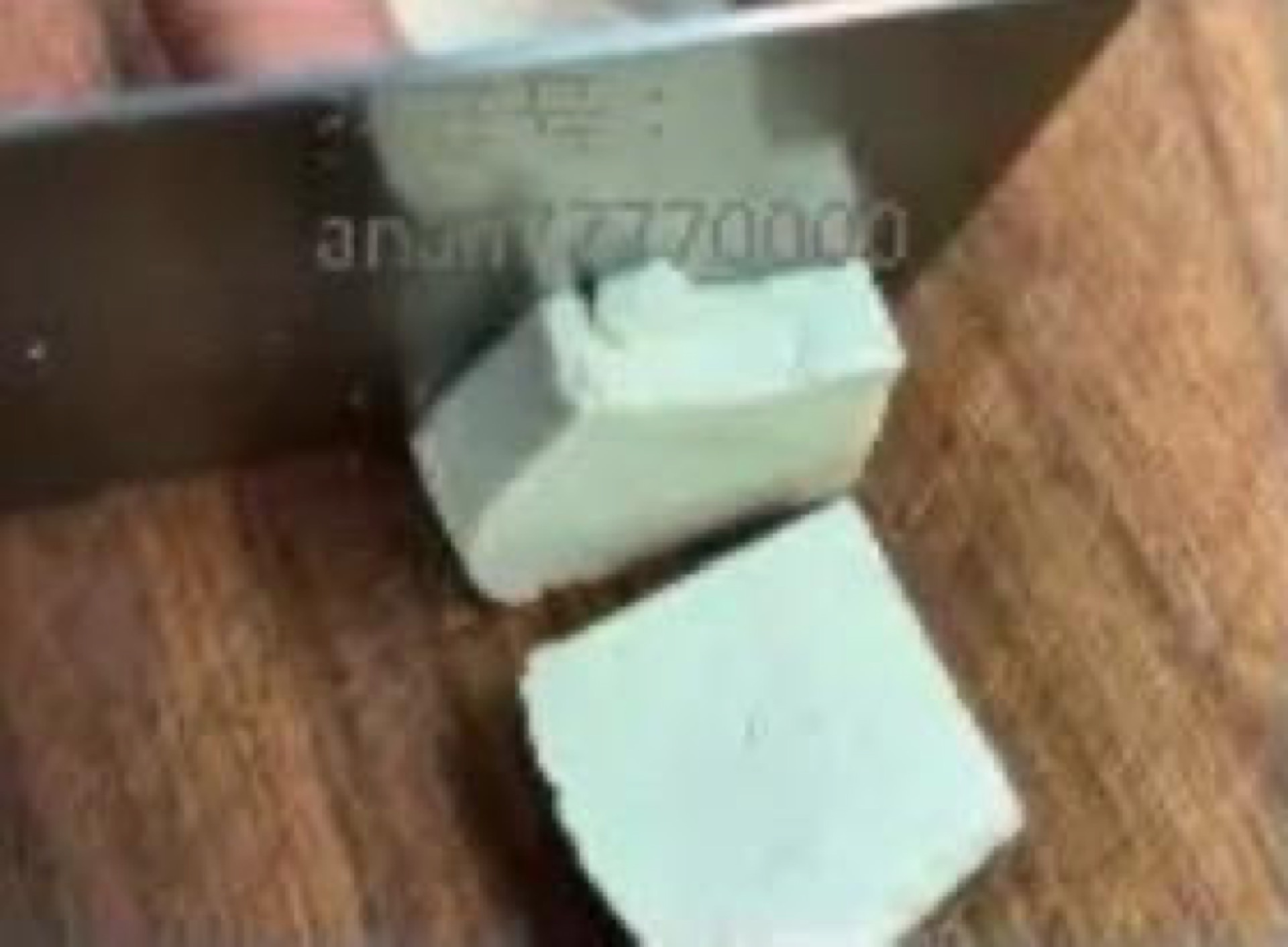 Thick slices of firm tofu on a board