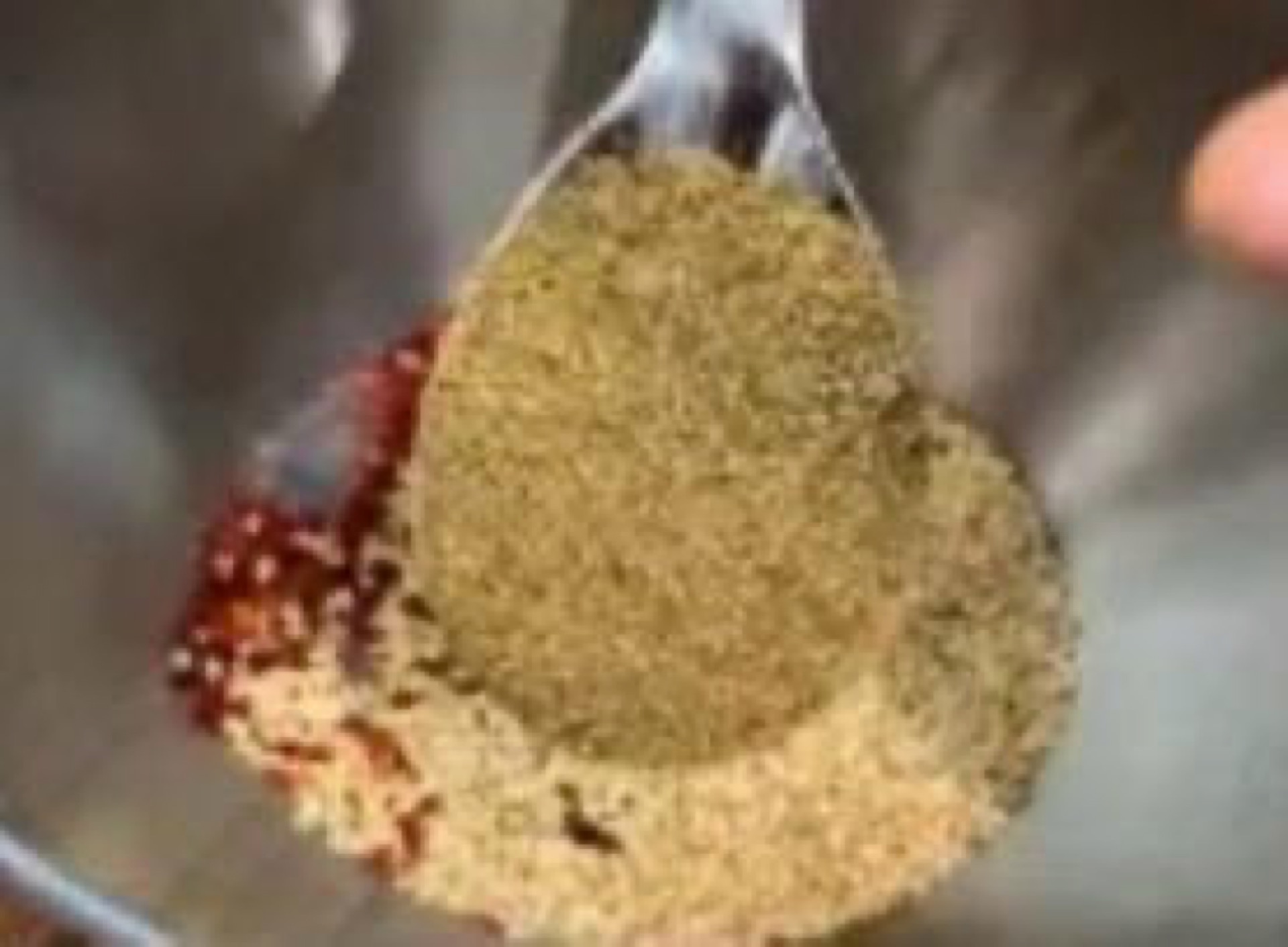 Chili cumin and sesame in a heatproof bowl
