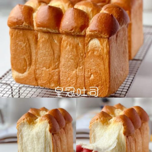 Crown toast fresh from the oven, snipped top brushed with butter
