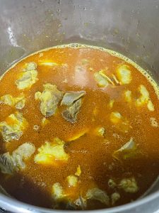 Transfer the mixture to a pressure cooker and cook over low heat for 18 minutes once it comes up to pressure.