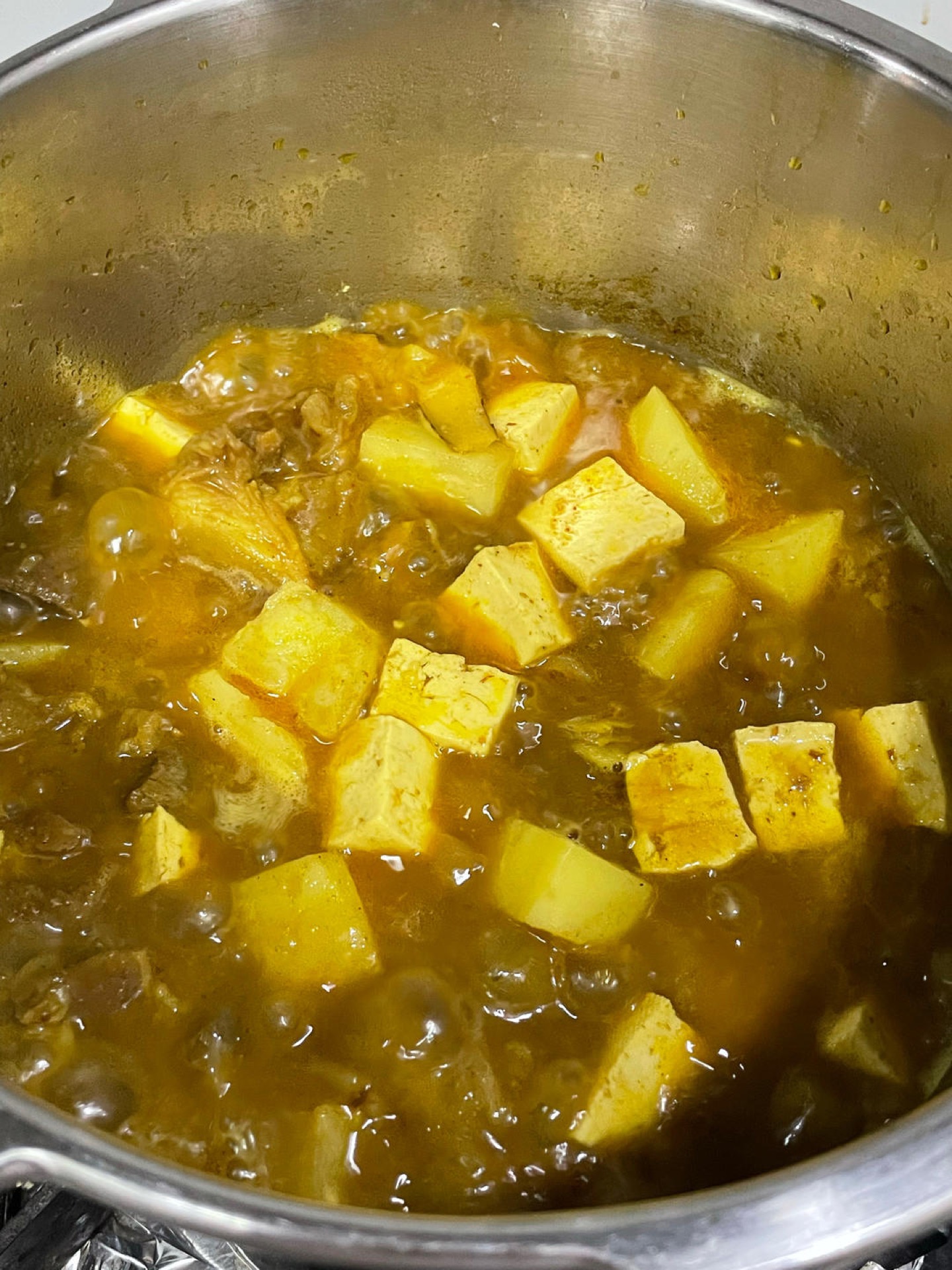 Simmer over low heat for 10 minutes until the potato is tender.