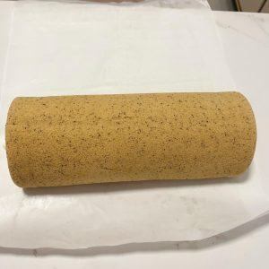 Roll cake batter poured into the lined pan