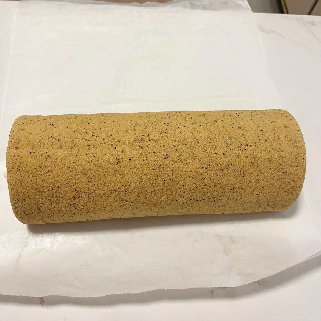 The rolled cake chilling in the refrigerator
