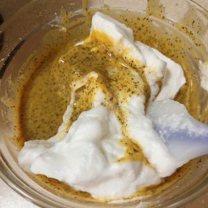 One-third of the meringue folded into the yolk batter