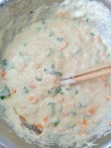 Fold the carrot and scallion through the batter until evenly mixed
