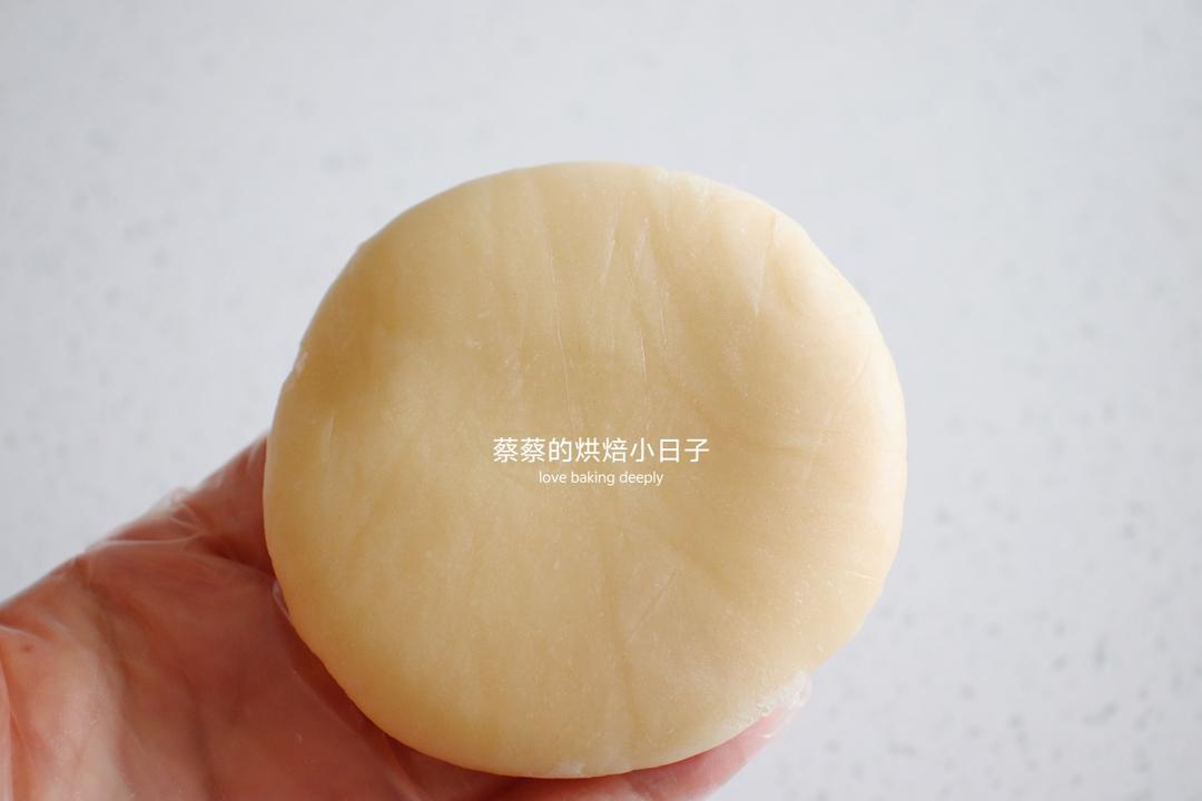 Mooncake with an irregular textured surface ready for baking