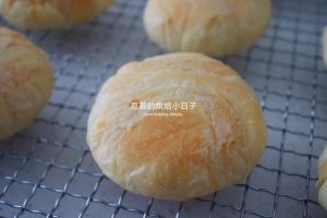 Stack of flaky mooncakes on a plate