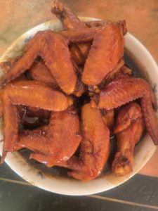 Four-cup chicken wings finished and plated
