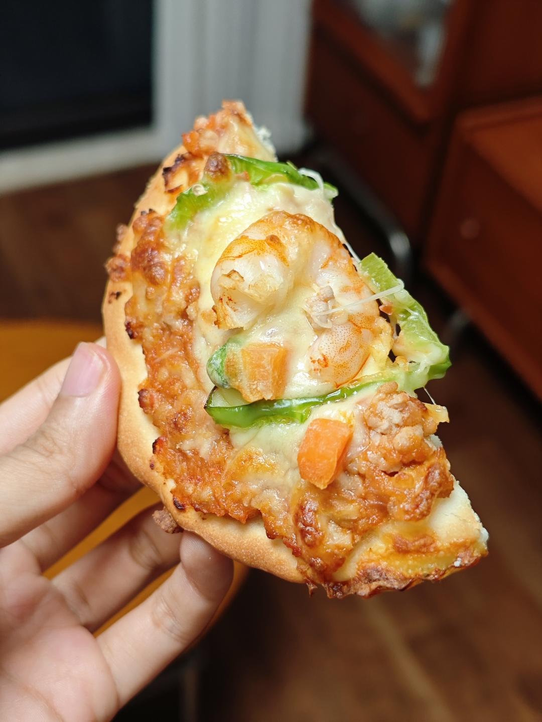 Four-inch homemade mini pizzas with melted mozzarella cheese