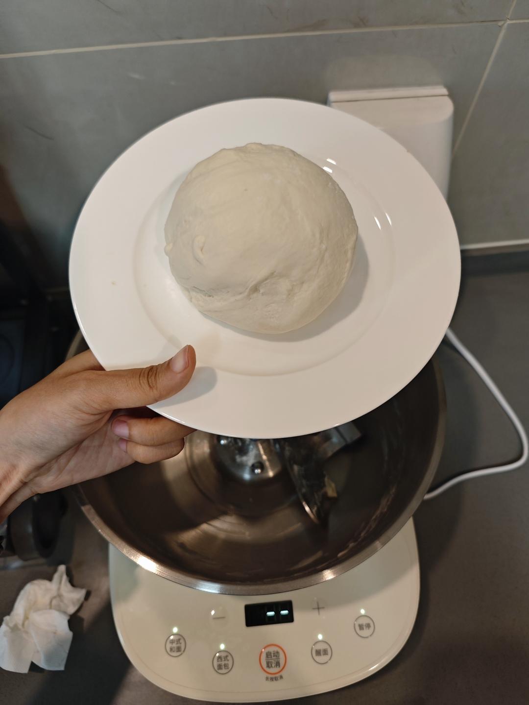 Pizza dough kneading in the stand mixer