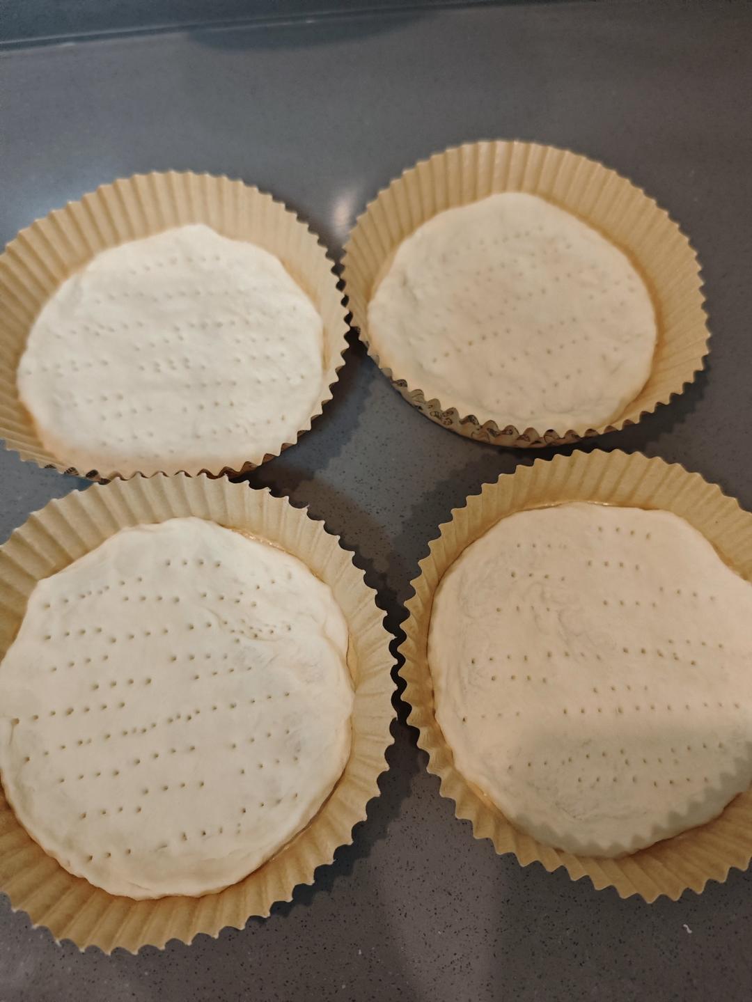Rolled four-inch pizza crusts docked with a fork