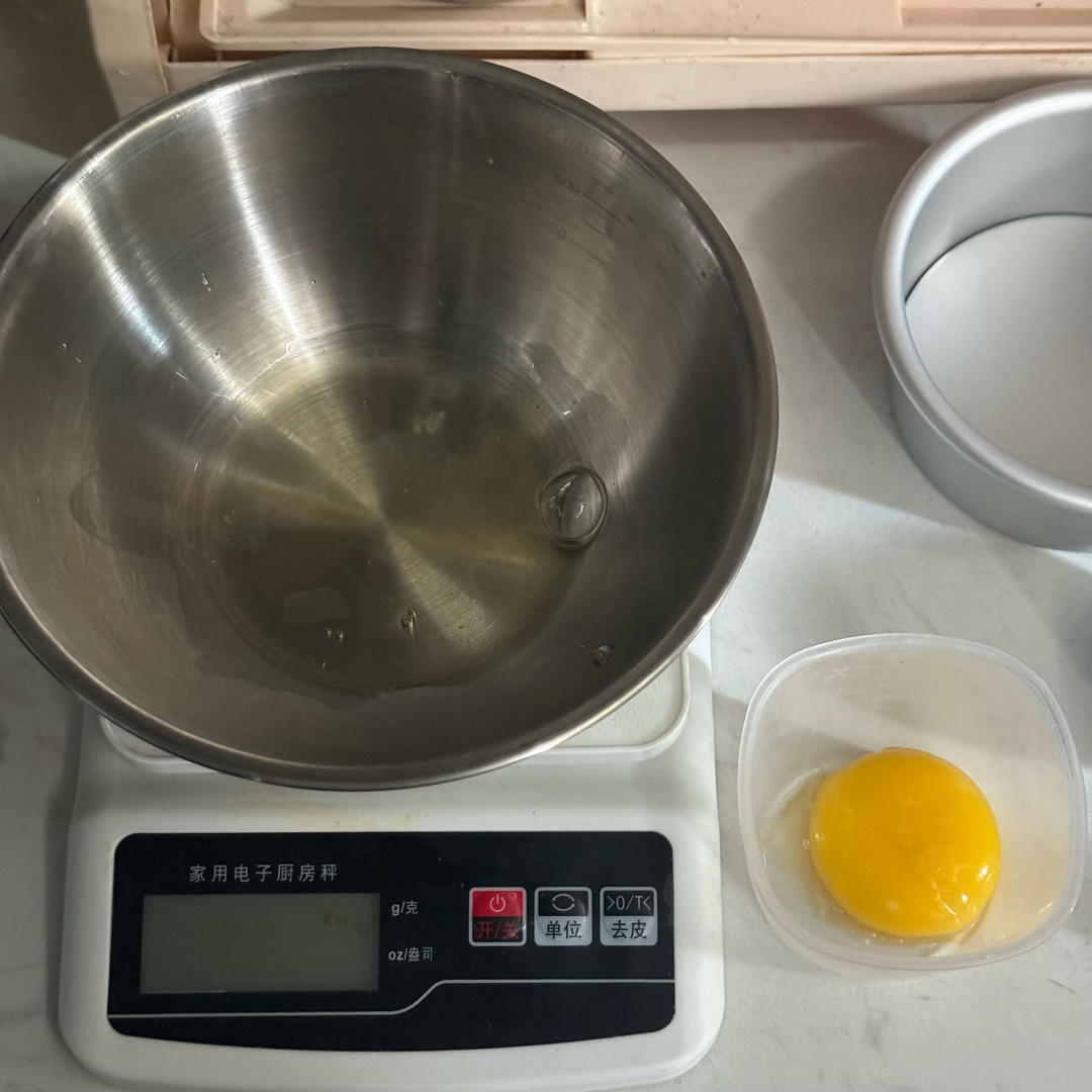 Egg separated into yolk and white in two clean bowls