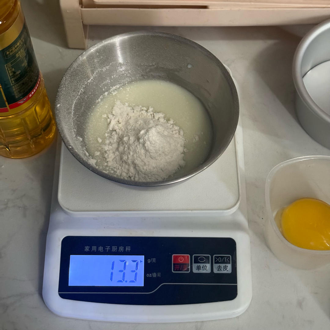 Milk flour and oil being mixed together