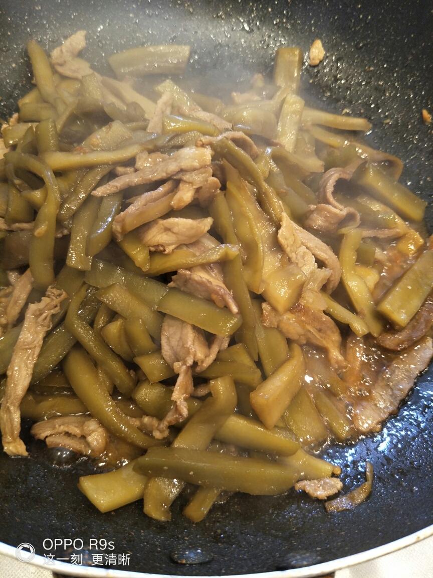 Add light soy sauce, oyster sauce, chicken po
