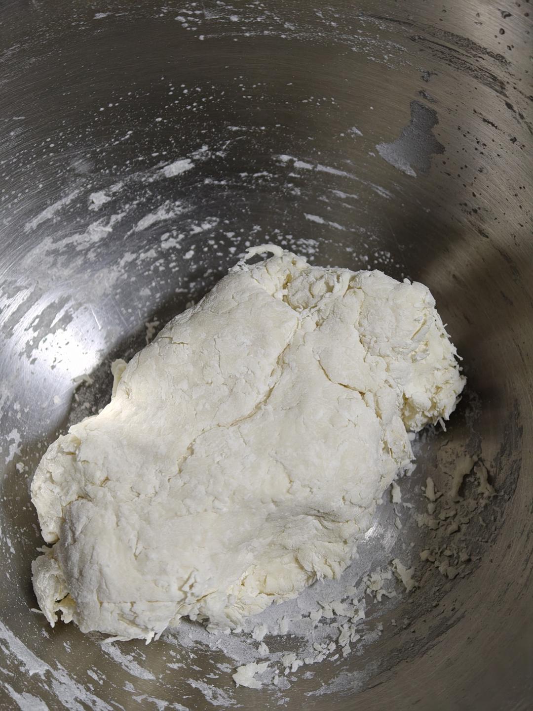 Kneading the dough into a ball for its first rest