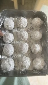 Roll the mixture into round meatballs and roll each one in cornstarch until fully coated.