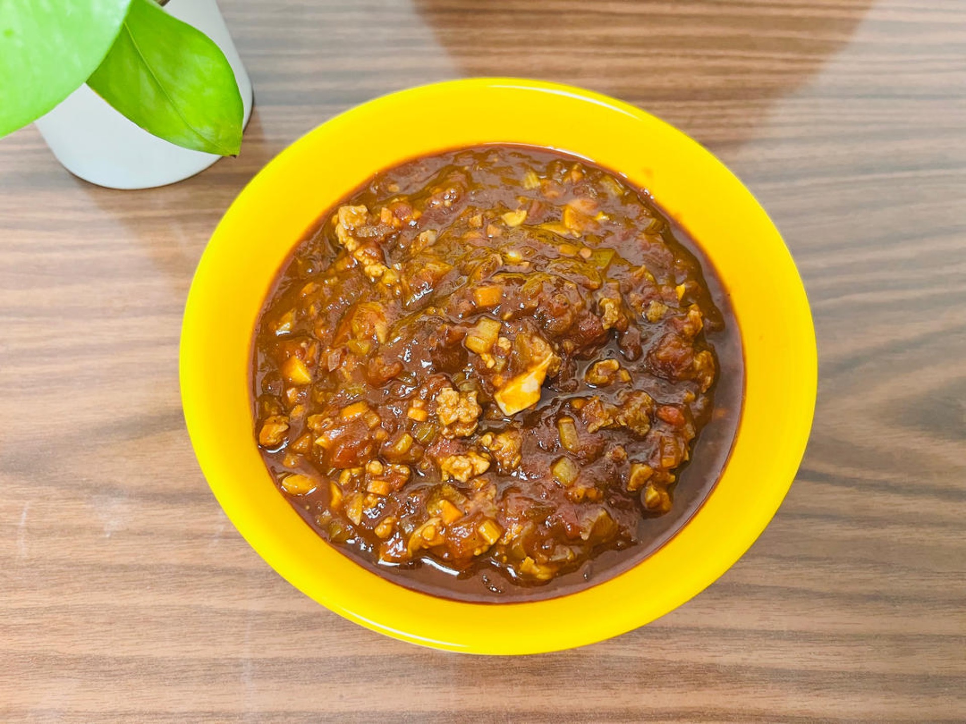 Scoop the sauce into a bowl.