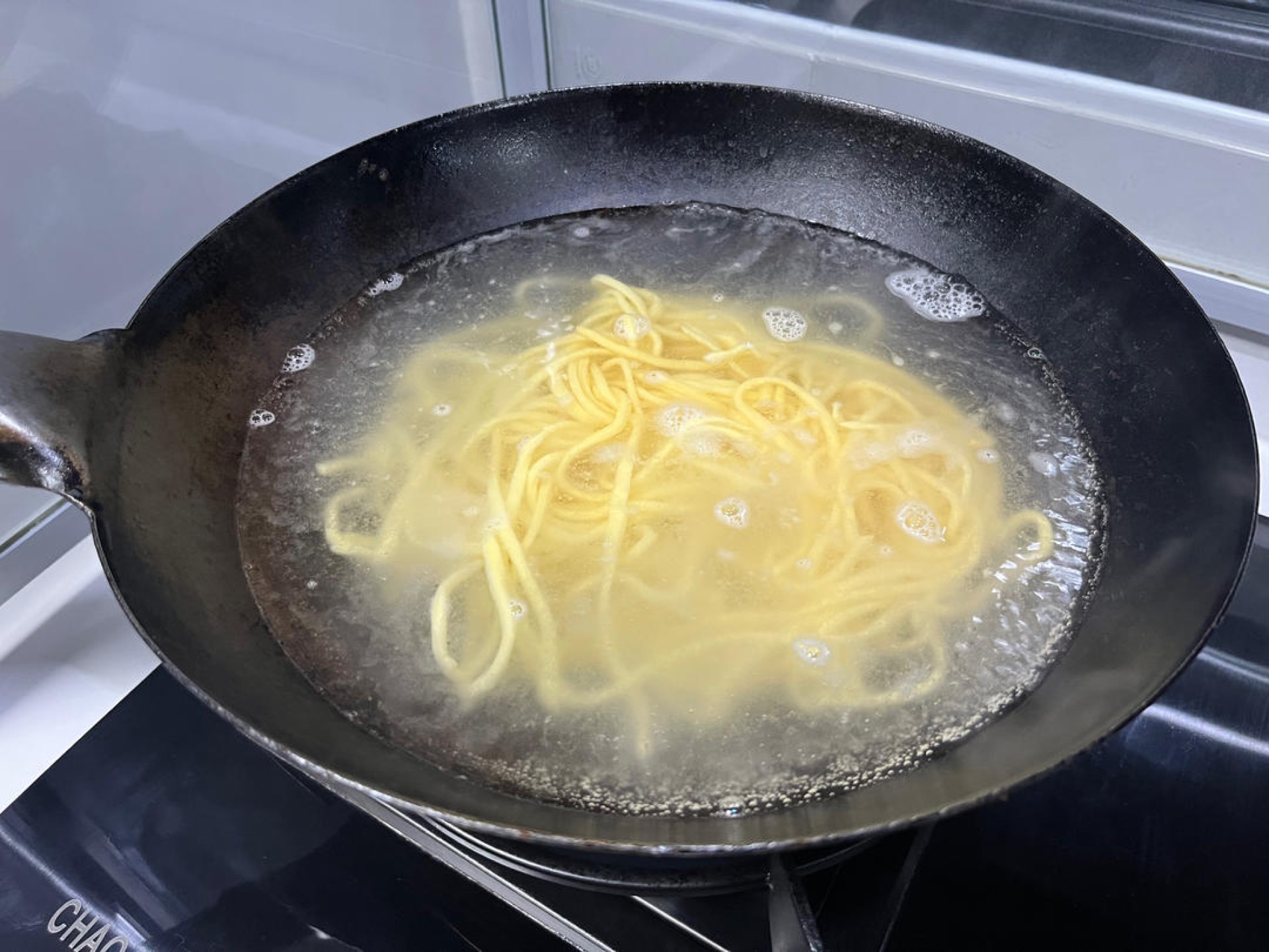 Once the water boils, add the noodles.
