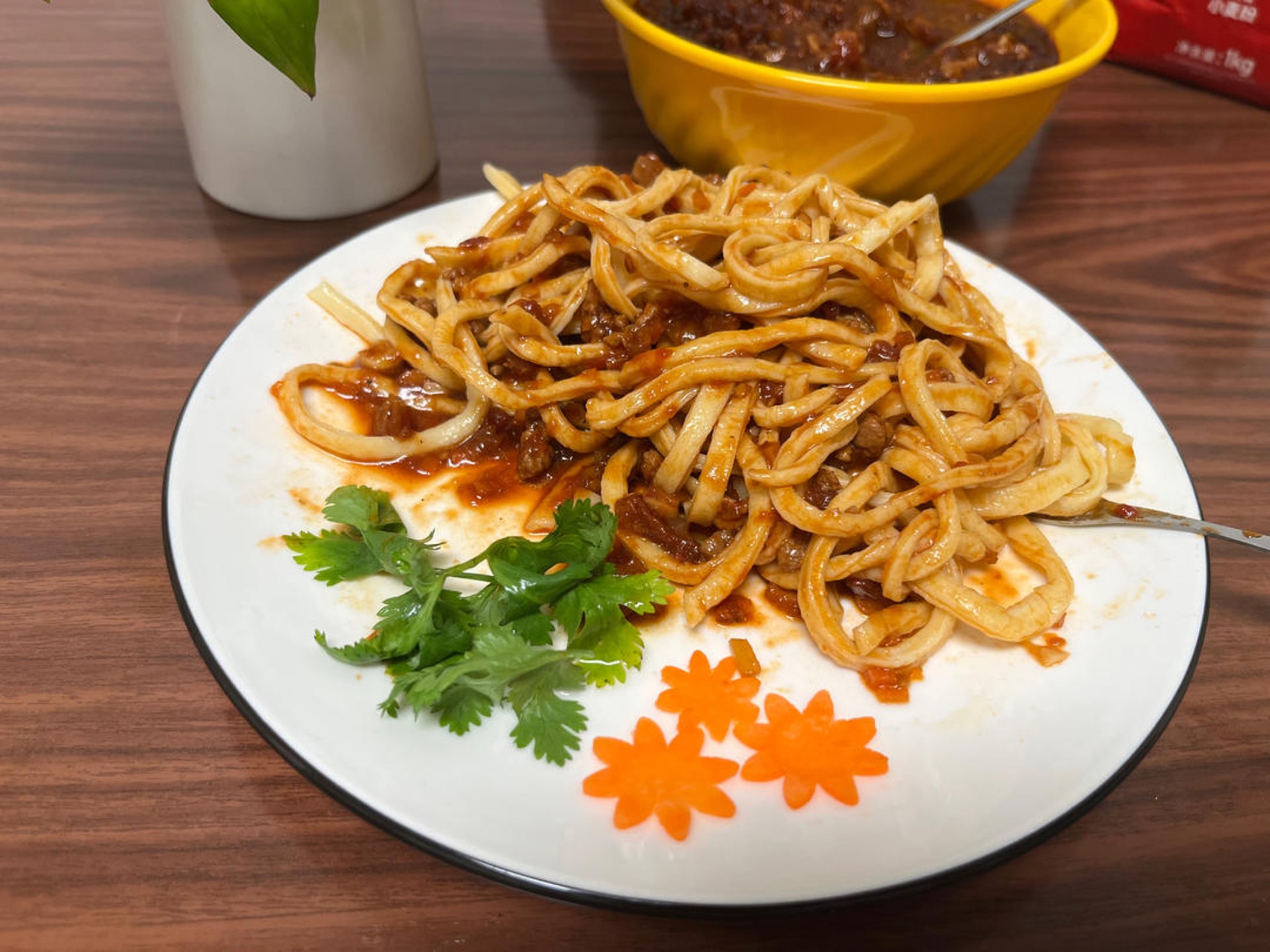 Toss the cooked handmade pasta with the meat sauce and dig in.