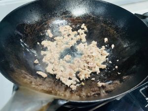 Stir-fry until the meat changes color.