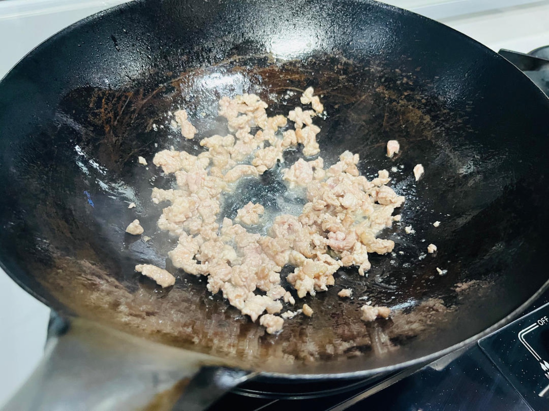 Stir-fry until the meat changes color.