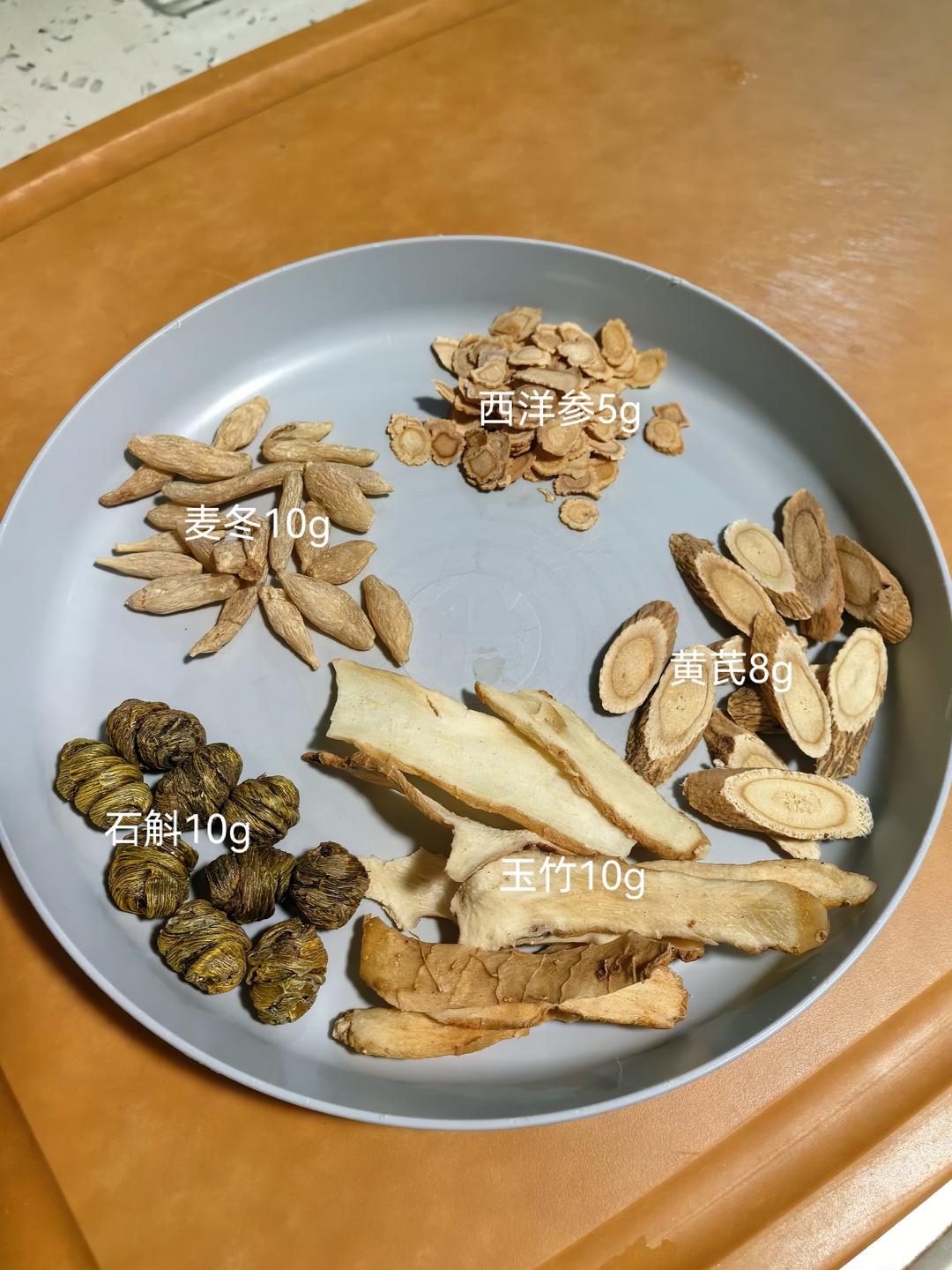 Rinsing the dried herbs in a bowl