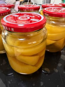 Finished canned yellow peaches, soft and ready the next day