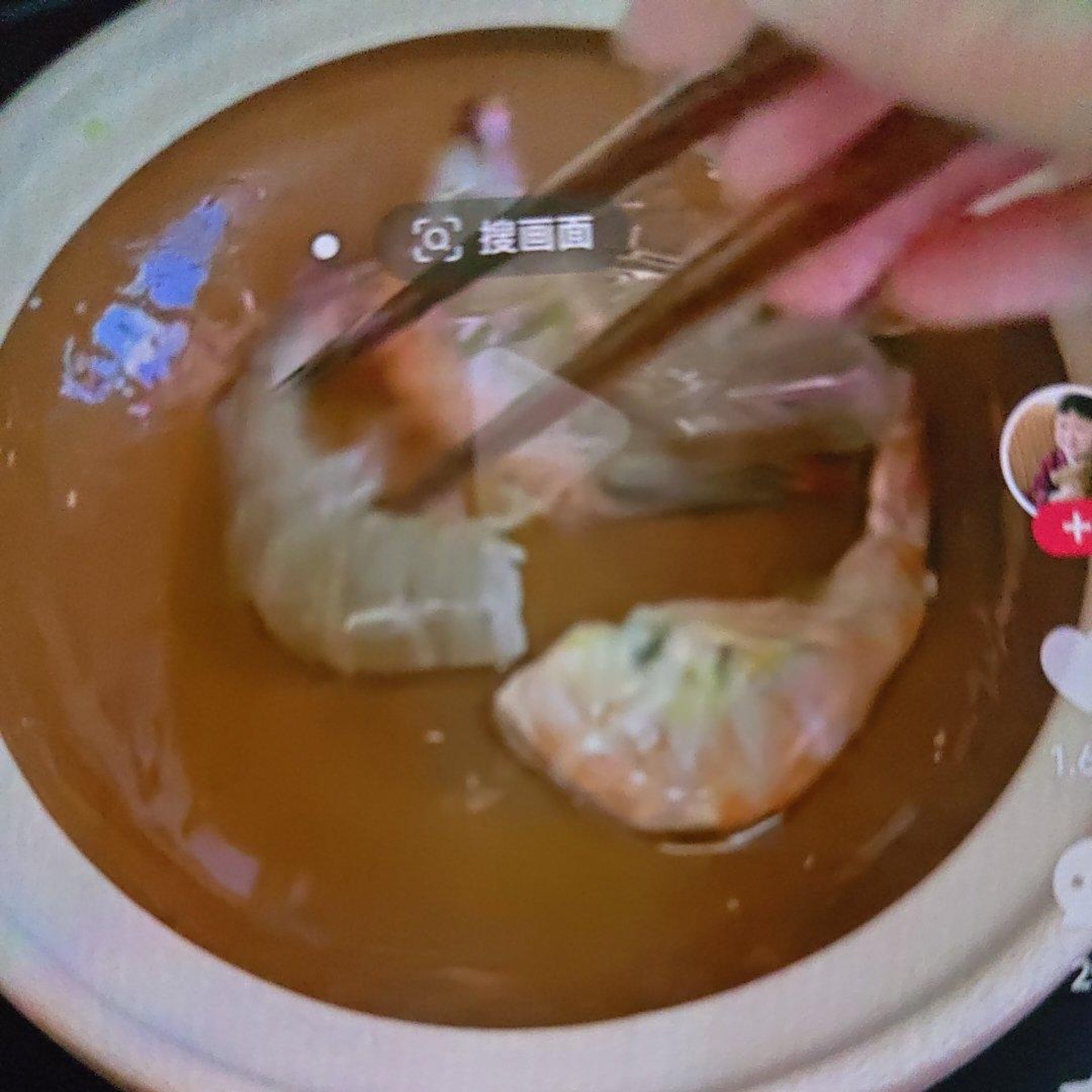 Heat the wok or clay pot over medium heat and briefly sear the four shrimp until they just turn pink and fragrant.