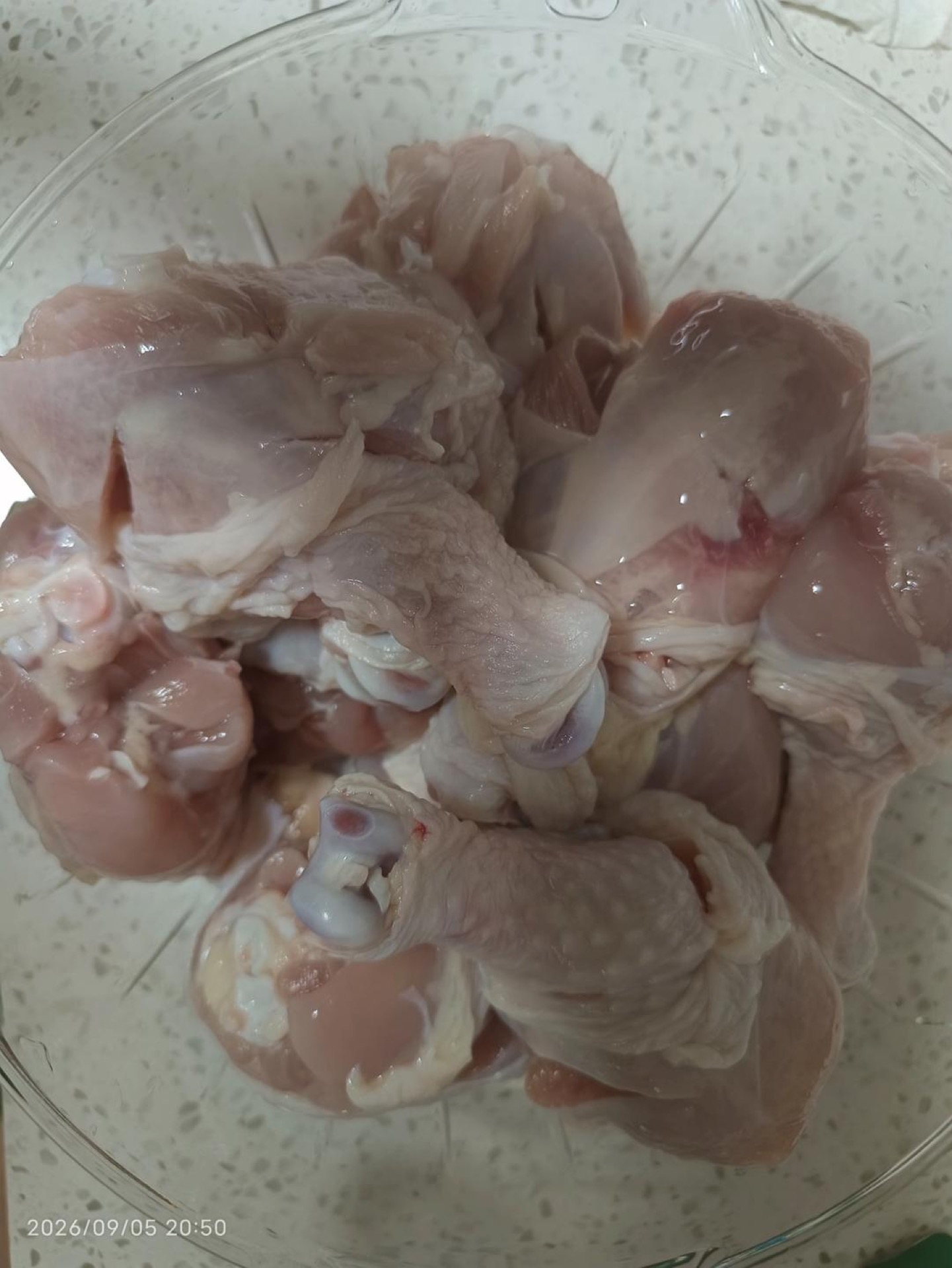 Chicken wings in a clean container