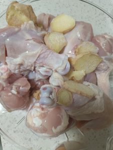 Adding ginger to the chicken wings