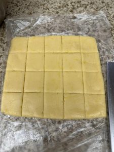 Shaping the dough into a log and slicing rounds