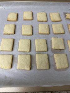 Cooling the baked lemon cookies on the sheet