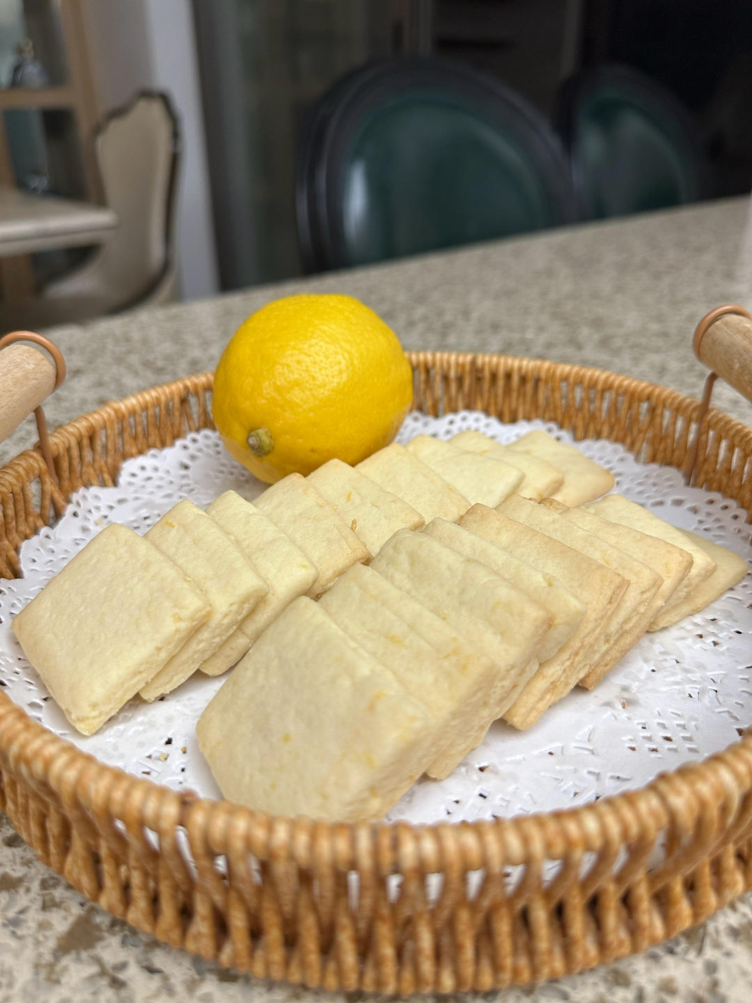 Breaking open a lemon cookie to show the crumb