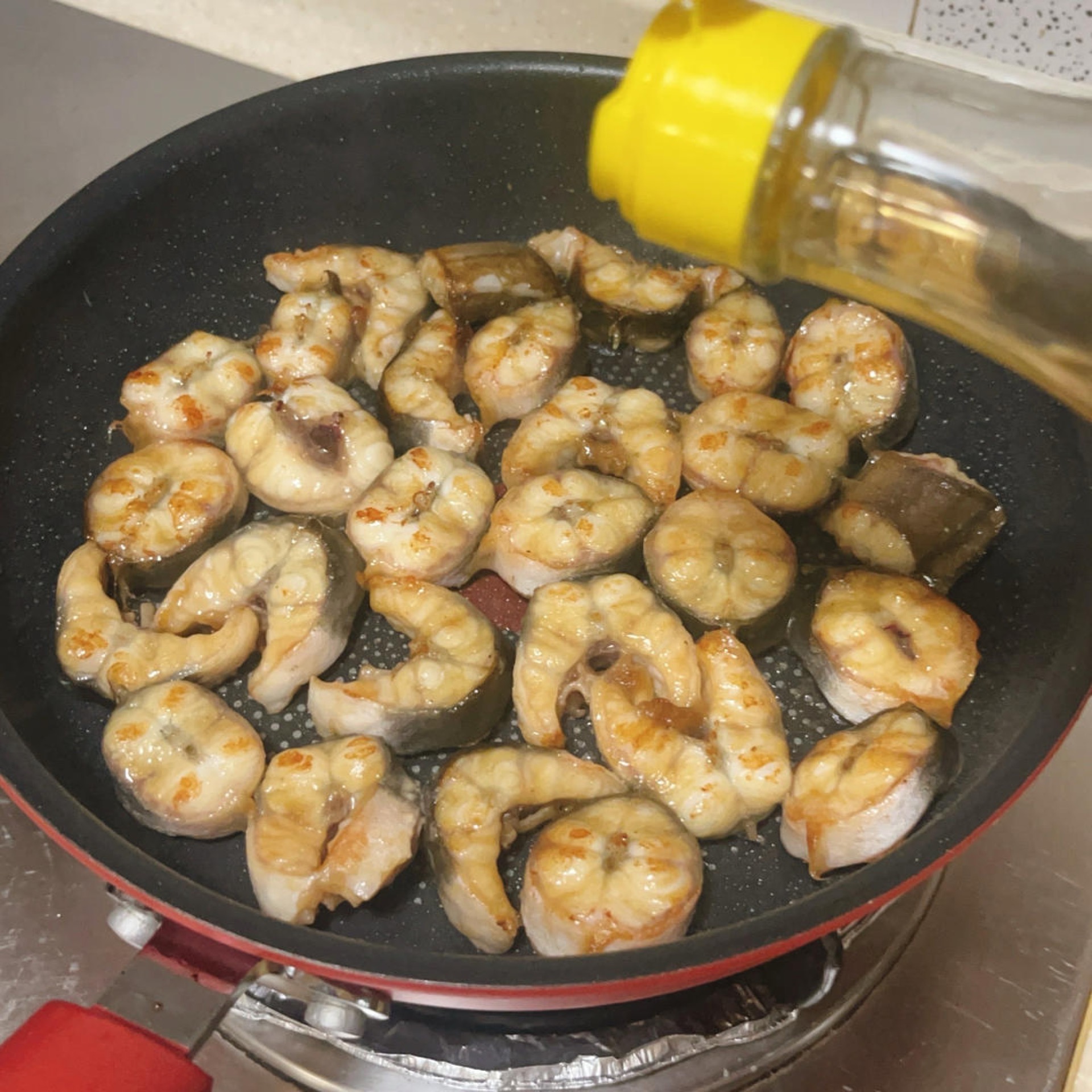 Shaoxing wine hitting the hot wok