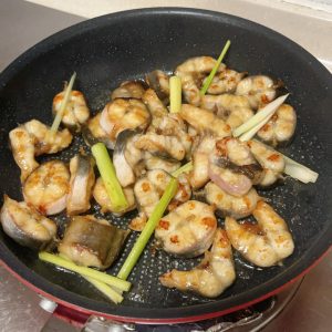 Lemongrass and soy sauce added to the seared eel