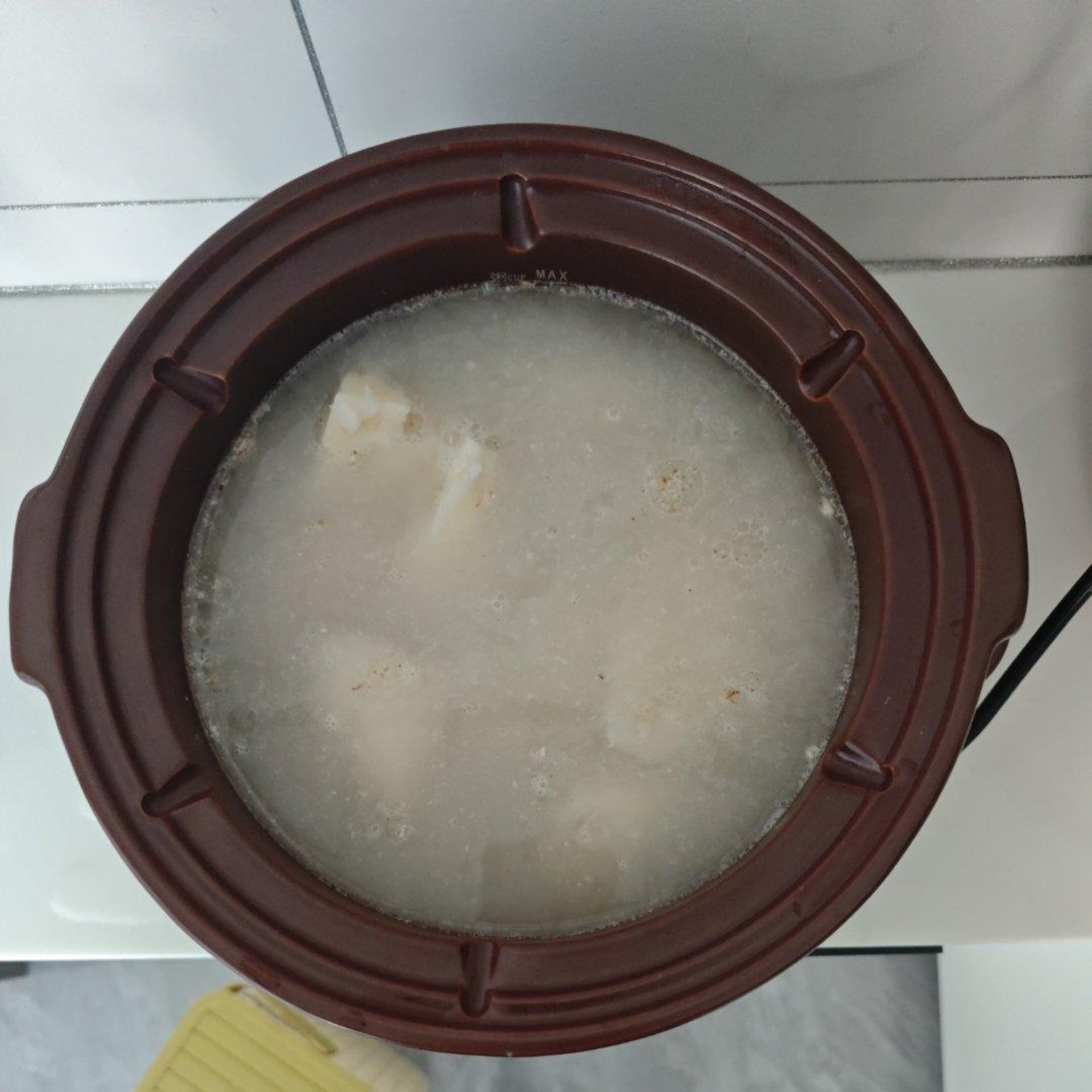 Finished lotus root pork rib soup in a clay pot