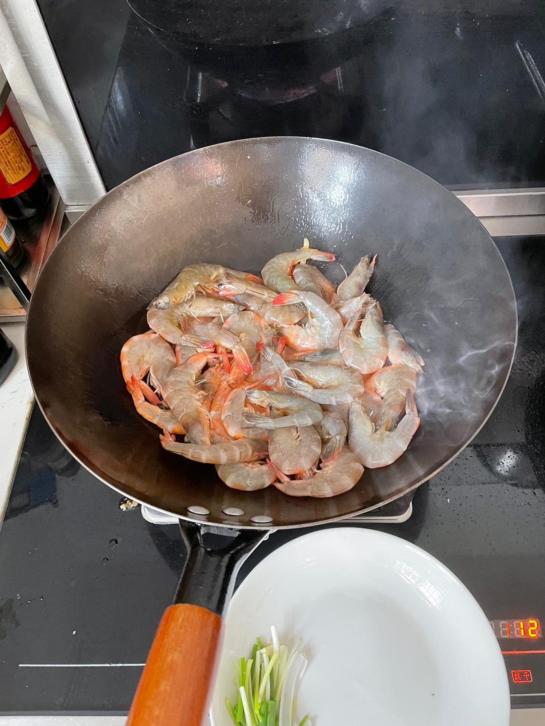 Heat oil, bloom the ginger and garlic, then a