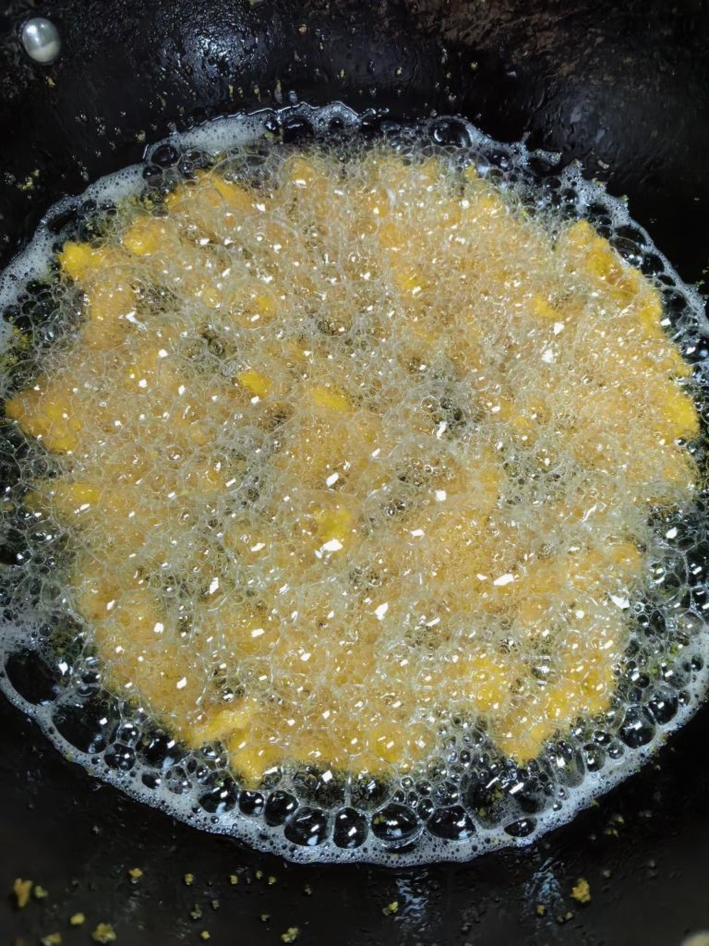 Heat the oil to 6成热 (about 320-340°F/160-170°C) and slide the strips in.