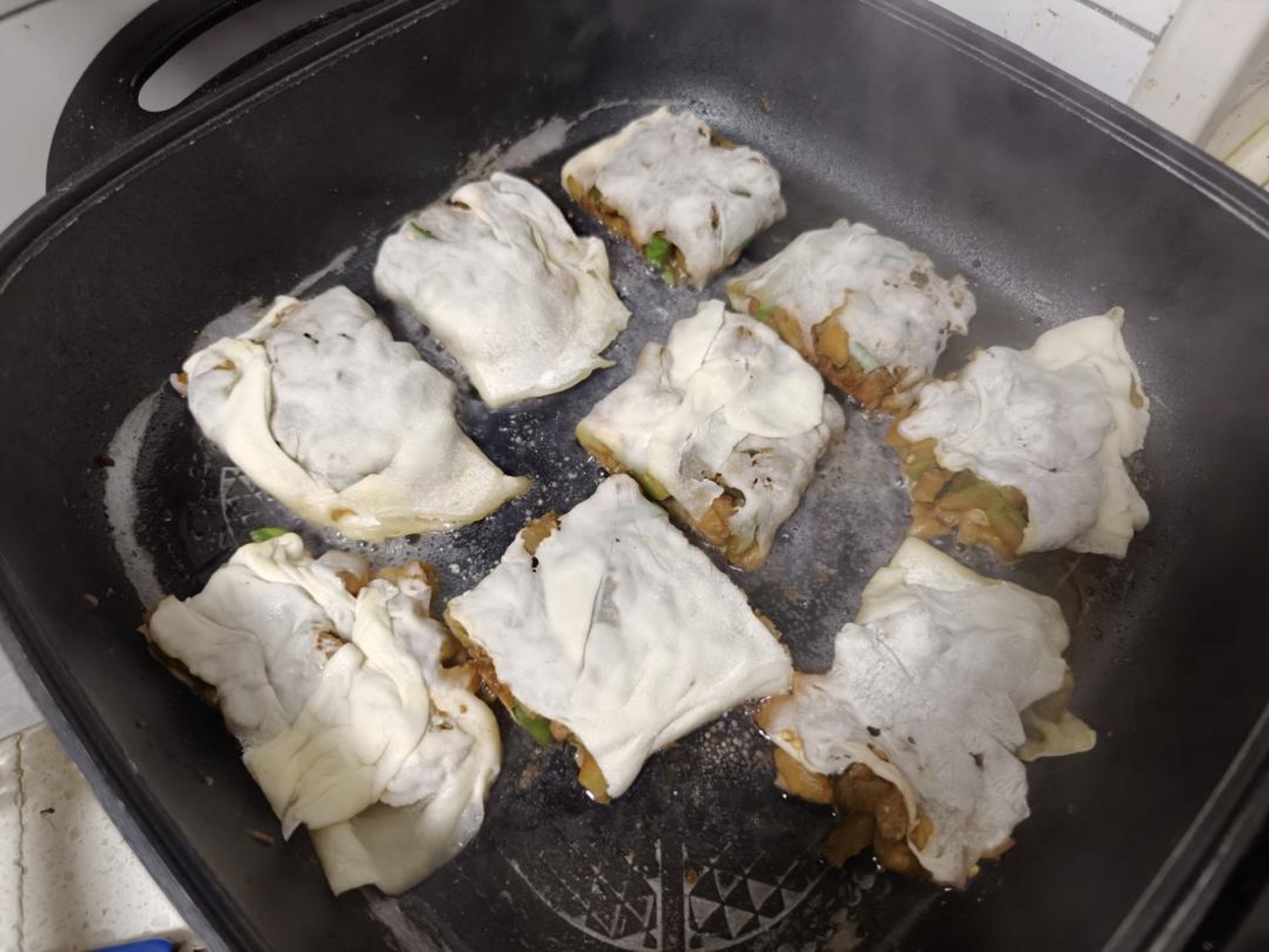 Once the bottom has set, add clean water, just enough to cover about one third of the pieces, cover with a lid and cook for 5 minutes.