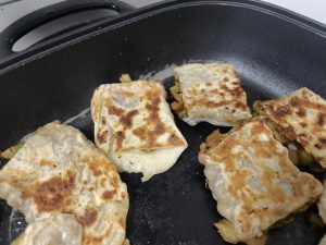 Fry one side until it is golden brown, then flip and fry the other side. Once both sides are done, they are ready to come out of the pan — super fragrant.