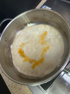Flatbread frying covered on the griddle