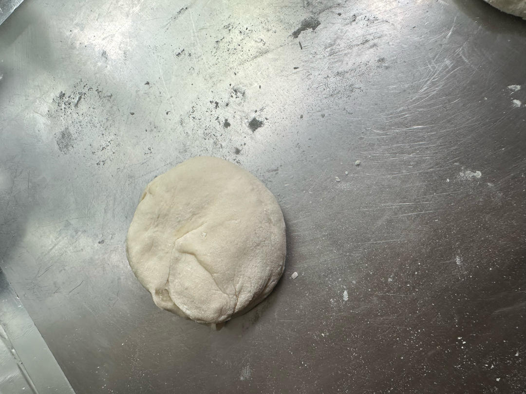 Coiled dough resting on the work surface