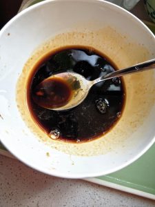 Combine the soy sauce, honey, oyster sauce (or Orleans roast seasoning), and a little dark soy sauce for color.