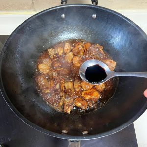 Add a small half spoon of dark soy sauce