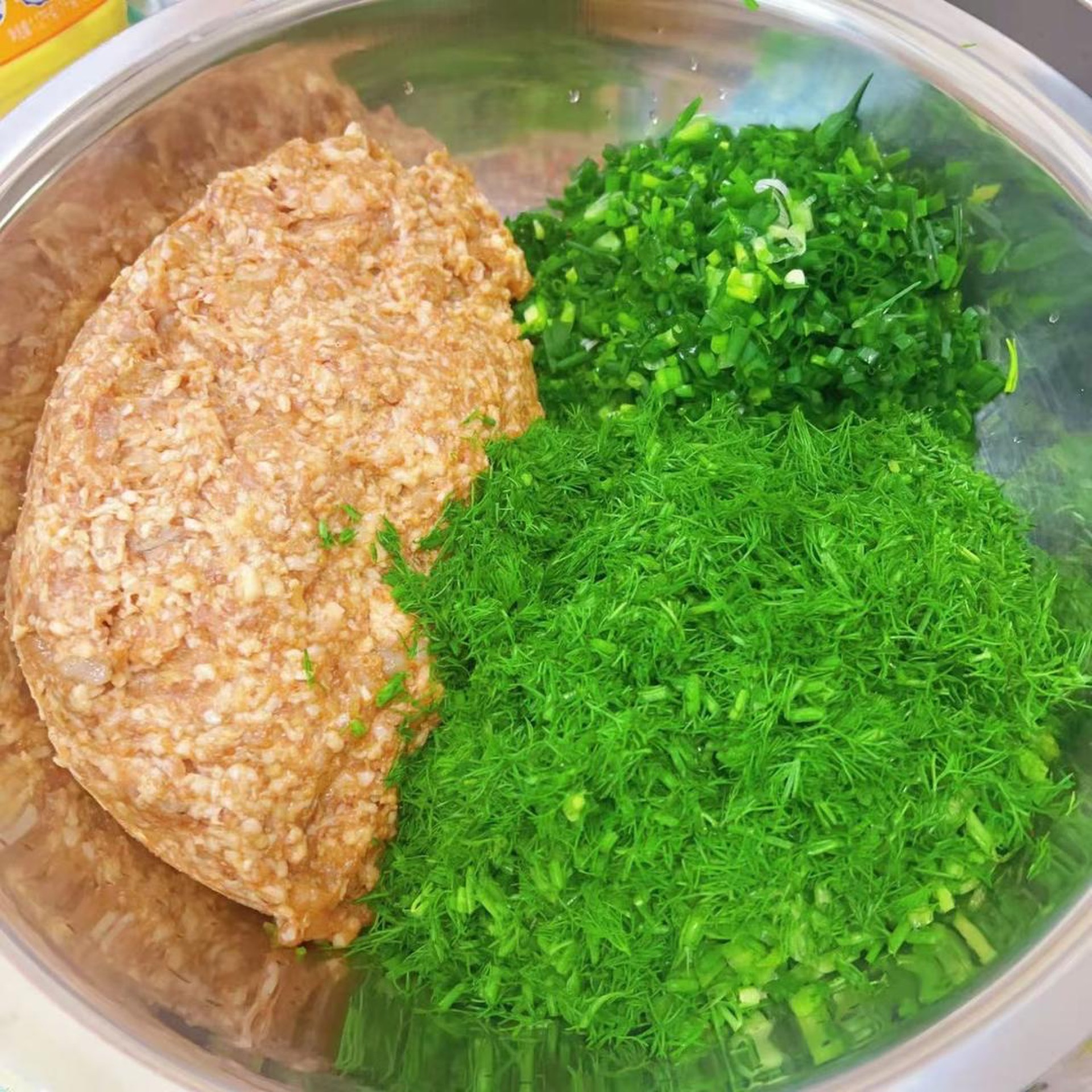 Chop the fennel and scallions, then add both to the meat mixture.